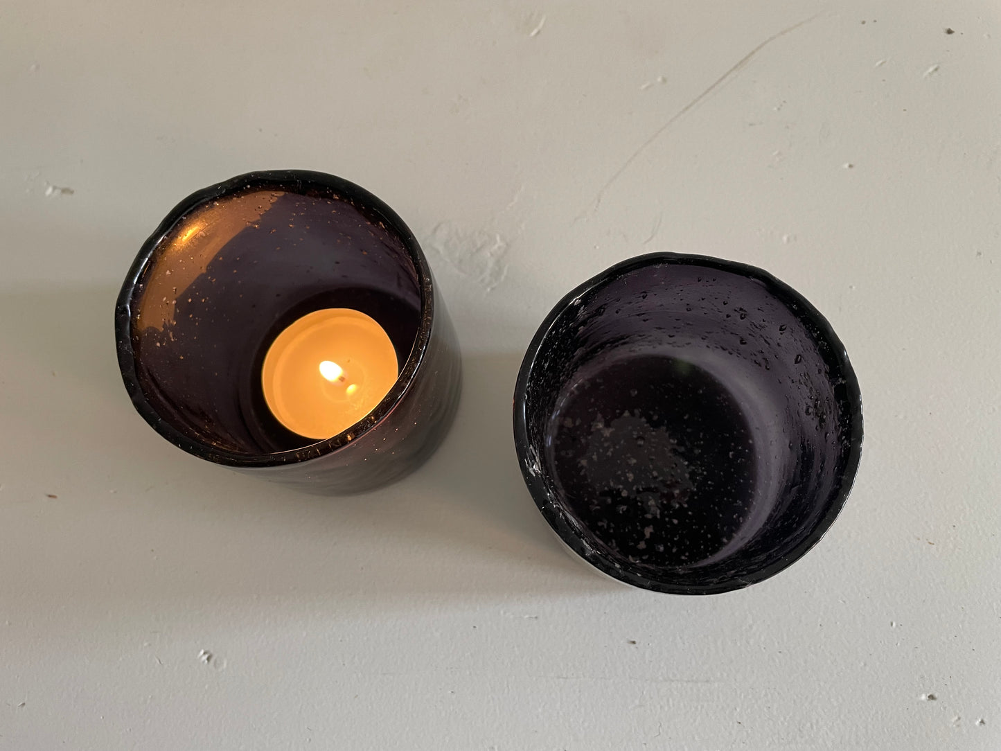 Waxinehouder van zwart glas