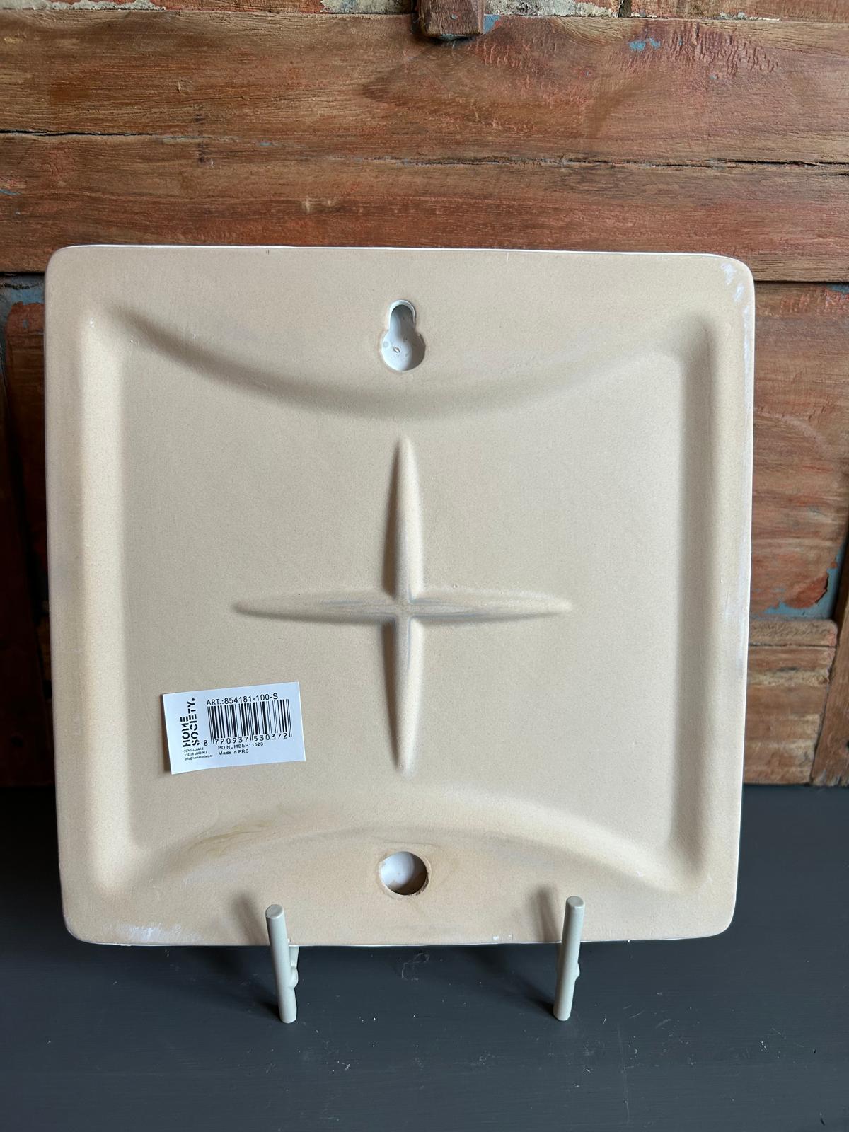 tegel in de vorm van een schelp op standaard